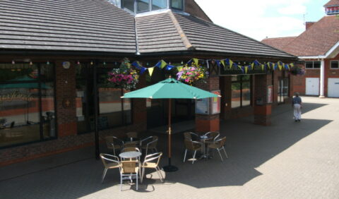 External view of Civic Centre with outside tables and chairs